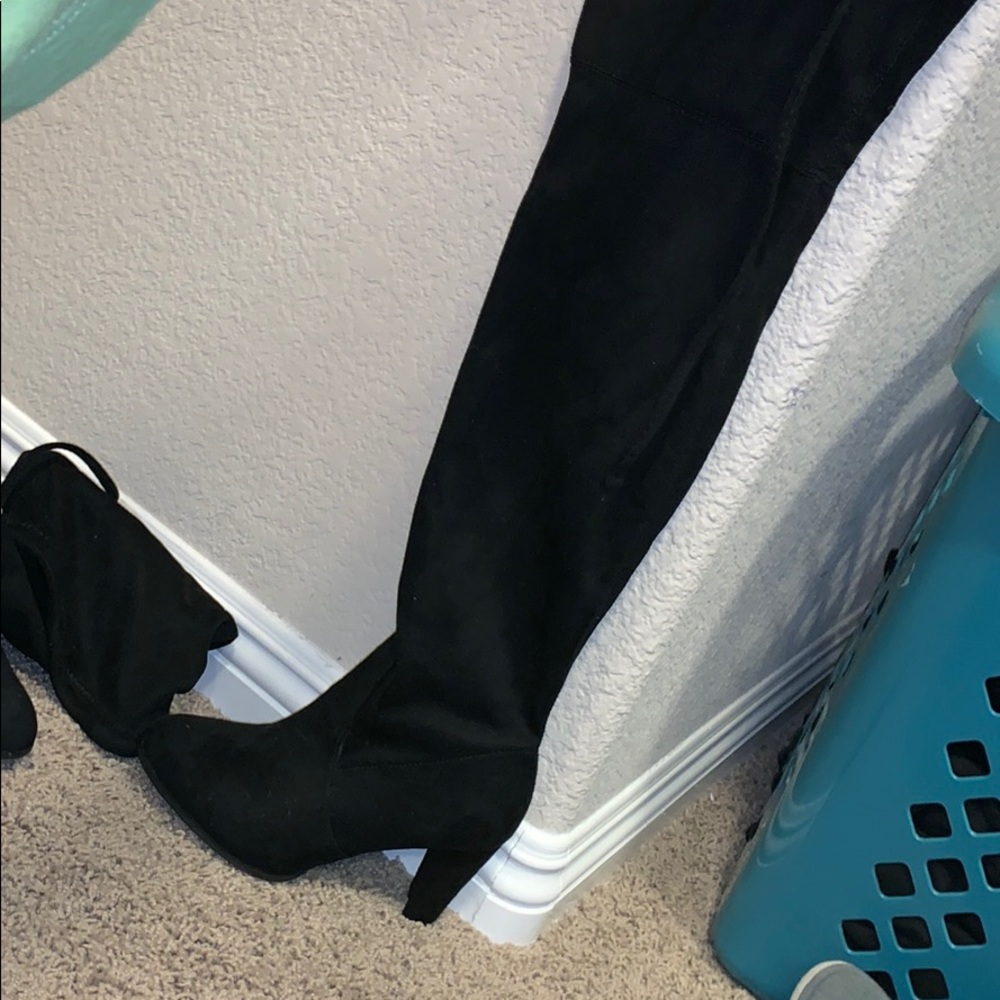 Thigh high black boots